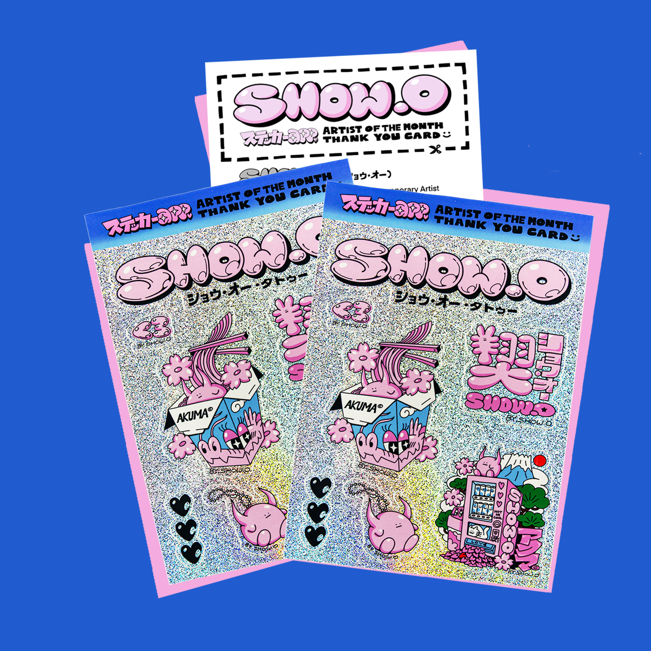 Colorful illustration with pink manga characters, English and Japanese text, featuring a thank you card and bold "SHOW-O" title.