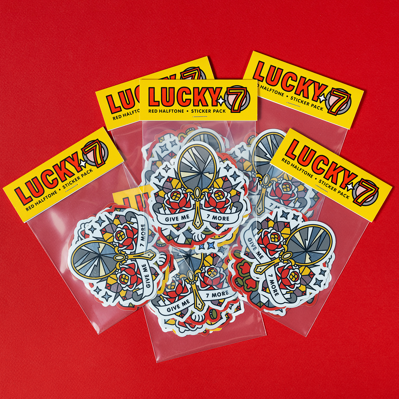 Custom sticker packs of colorful die cut stickers featuring various designs, labeled LUCKY 7.