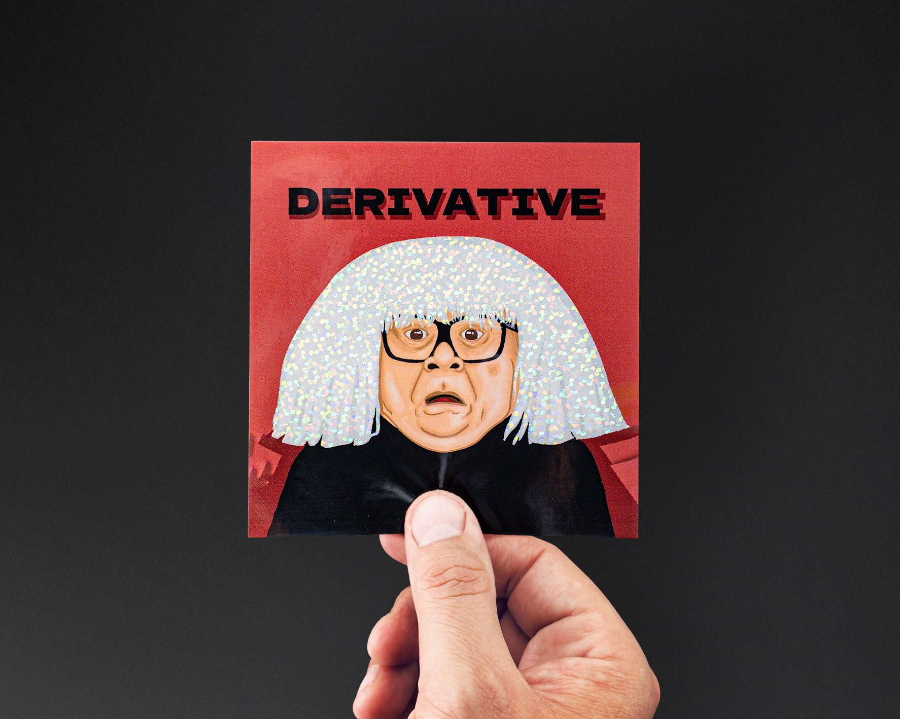 Glitter sticker of a humorous illustration of a surprised person wearing a white wig, titled "DERIVATIVE" on a red background.