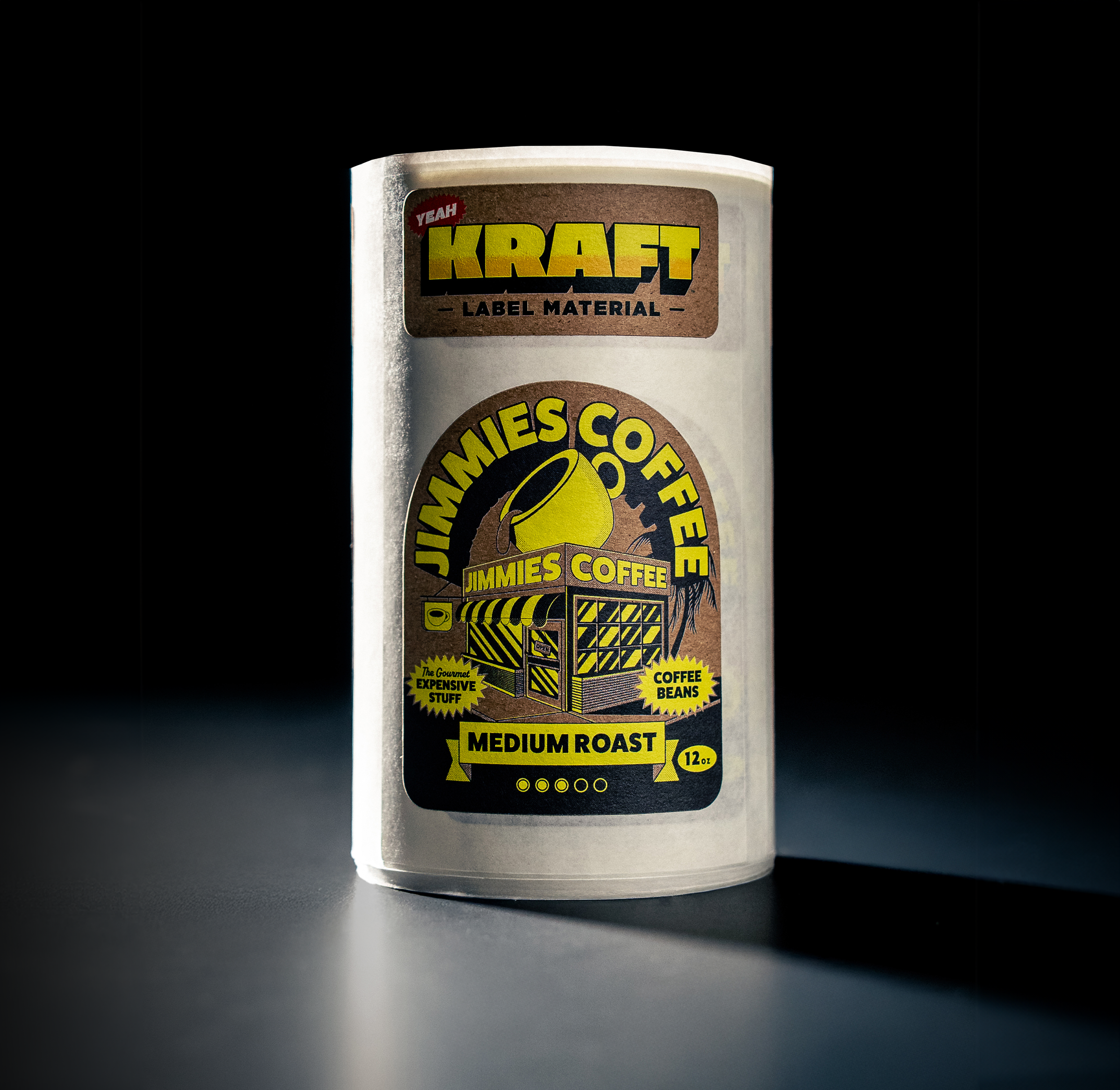 Roll of labels for "Jimmies Coffee" medium roast, featuring a yellow coffee cup design on a black background, under "Kraft Label Material."