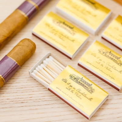 Golden stickers on matchboxes.