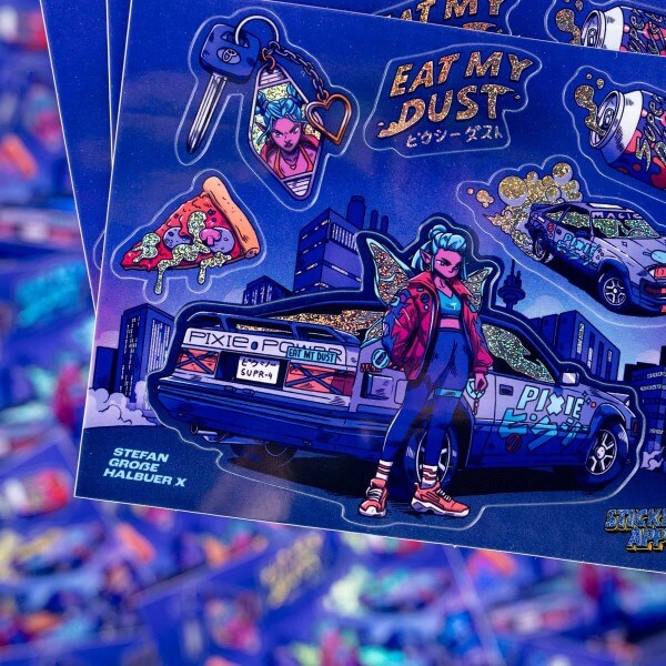A vibrant sticker sheet in Pixie Dust featuring a cyberpunk-inspired character, a car with neon accents, and various designs like pizza and keys. The text 'Eat My Dust' is prominently displayed.
