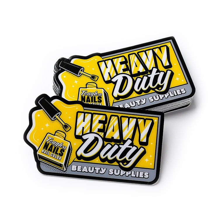 Two yellow and black Heavy Duty stickers.